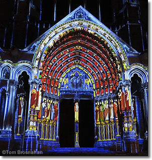 North Portal of Chartres cathedral illuminated, Chartres, France